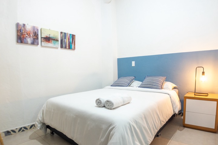 Cama doble de la habitación Azulado 12